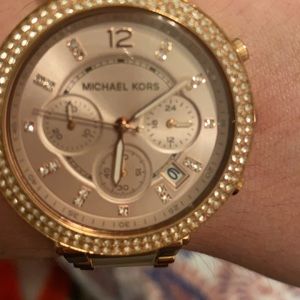 Rose gold woman’s Michael Kors watch